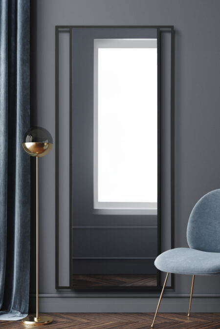 Tall twin bar industrial mirror styled in a moody grey contemporary living room